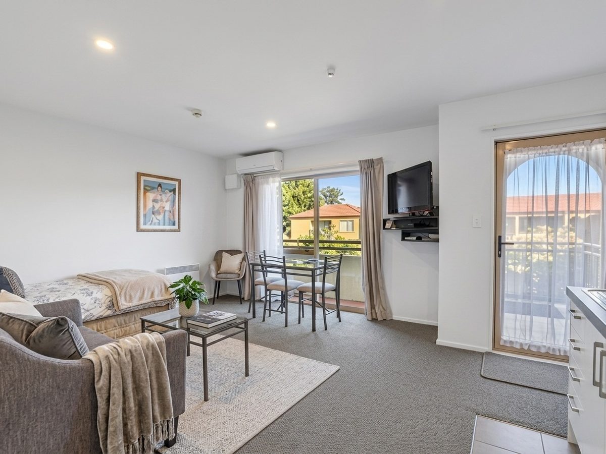 Spacious Spa Suite interior — generous lounge, king bed and private spa